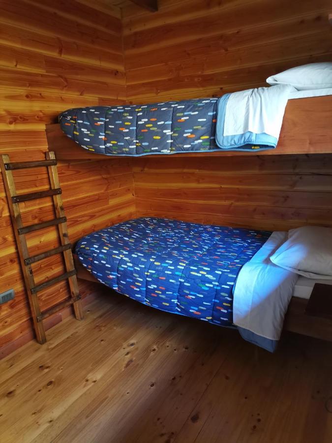 Cabanas Arcoiris Пукон Экстерьер фото