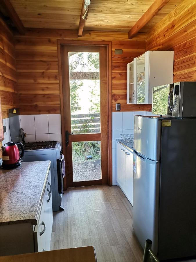 Cabanas Arcoiris Пукон Экстерьер фото