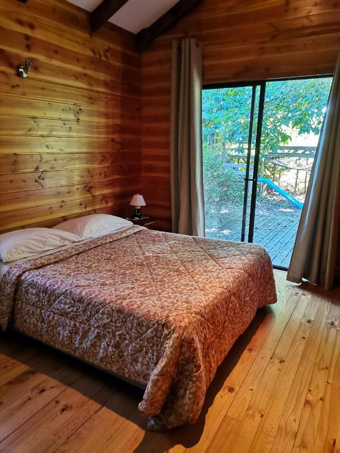 Cabanas Arcoiris Пукон Экстерьер фото